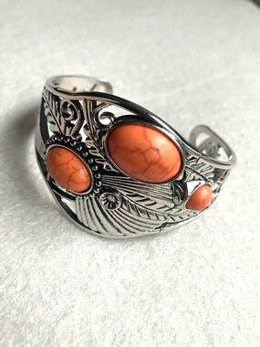 Silver southwest cuff bracelet with orange stones